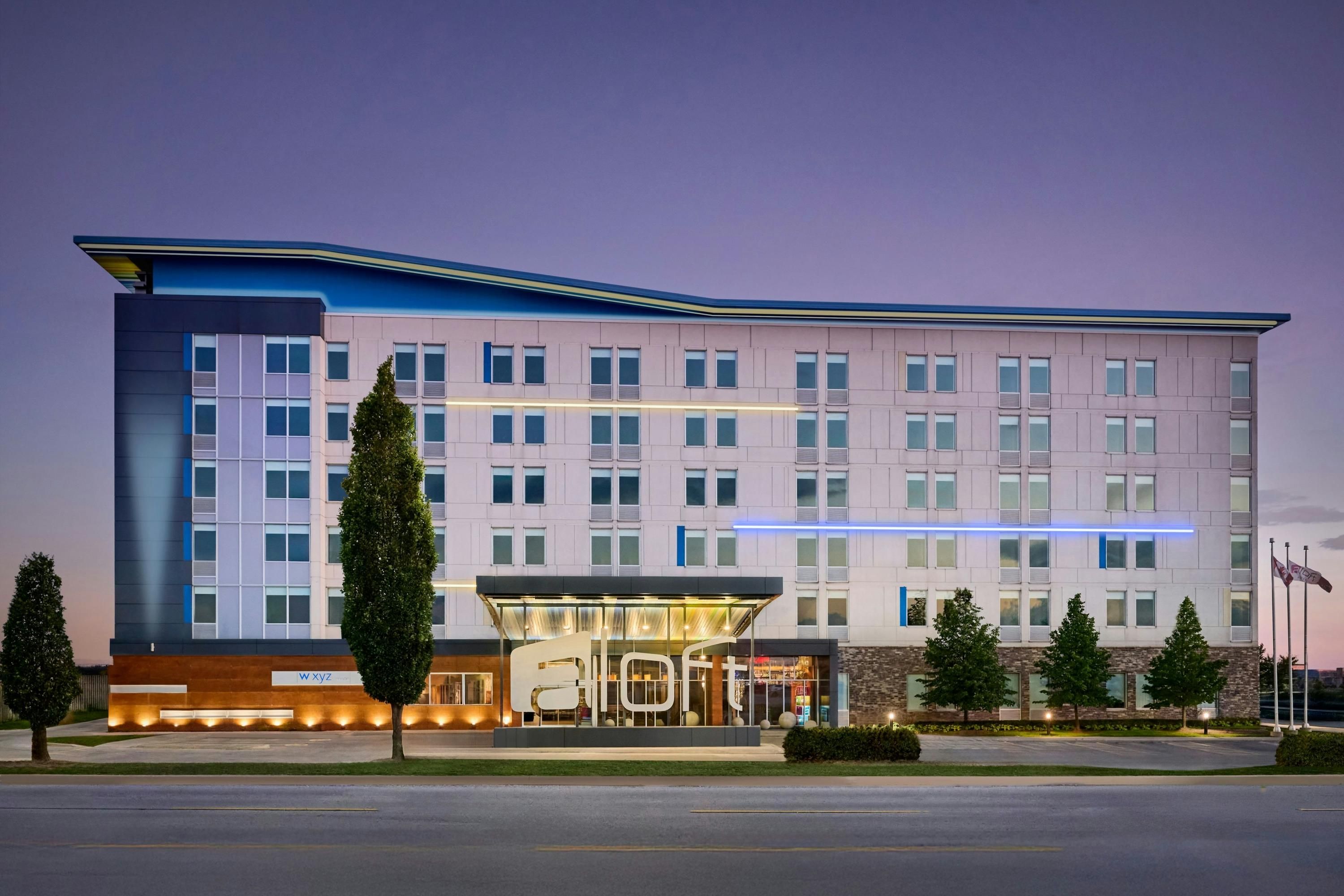 Aloft Vaughan Mills – Building exterior at twilight