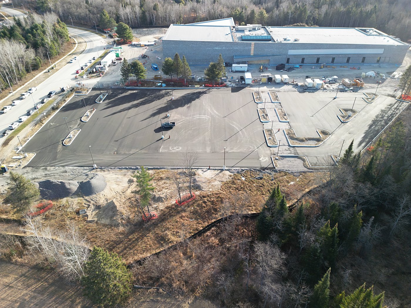 Aerial drone view – parking lot paving progress