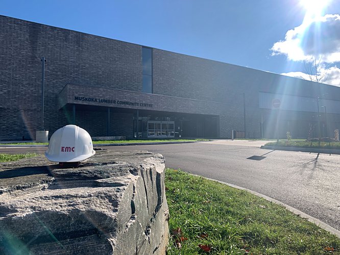 EMC hardhat with completed Muskoka Lumber Community Centre