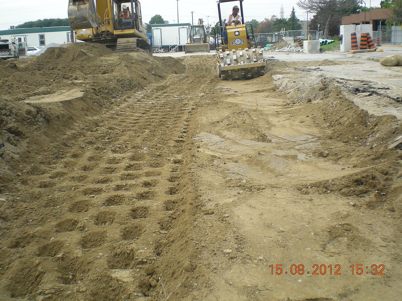 Site grading with heavy equipment at Centennial College