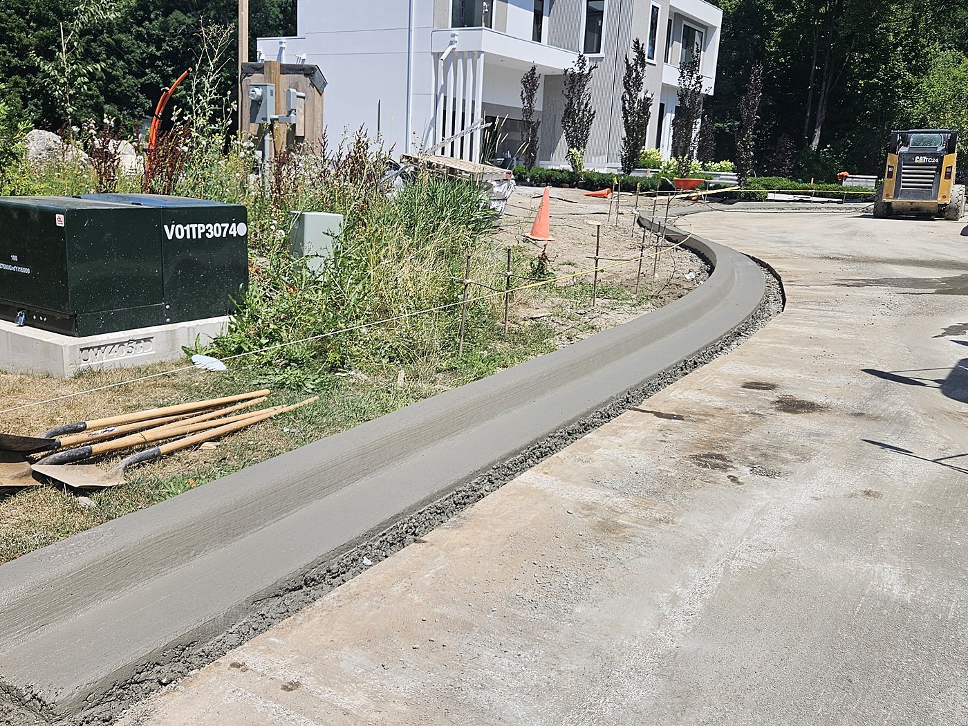 Fresh curb line along Donna Mae Crescent with modern homes
