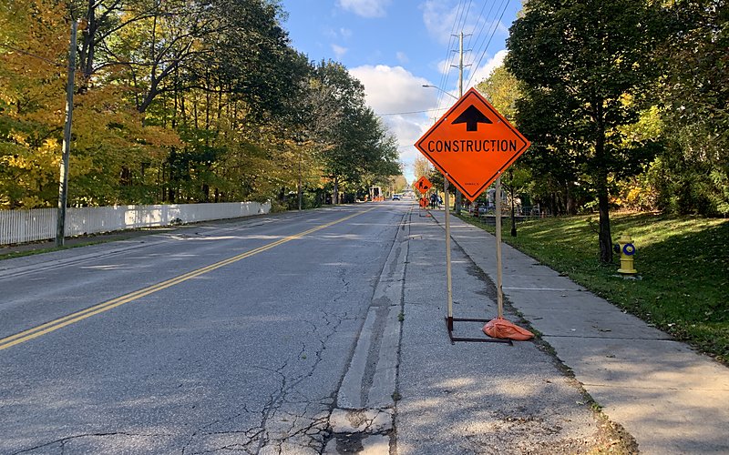 Construction signage on road during subdivision servicing