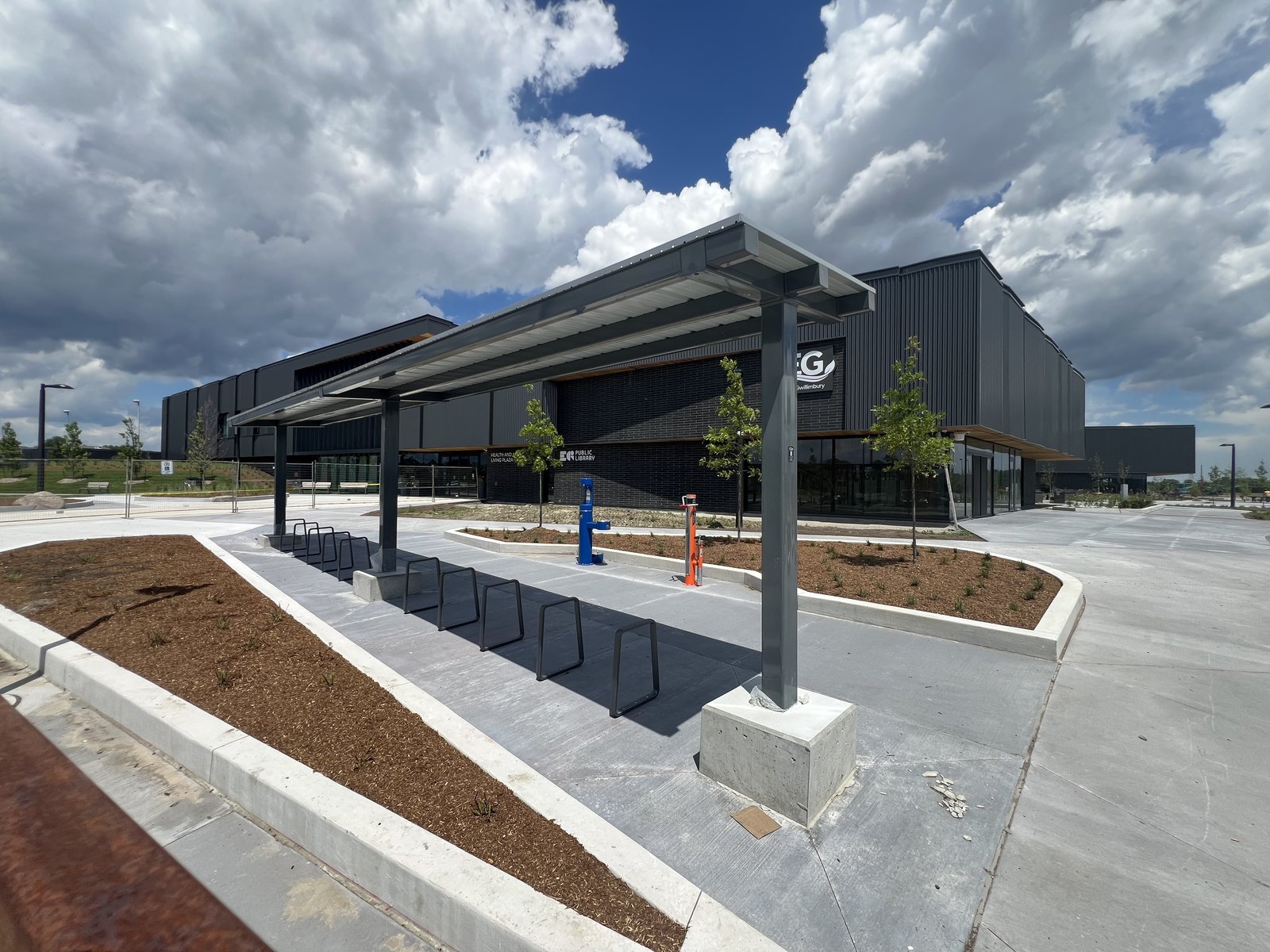 East Gwillimbury Health and Active Living Plaza – entrance plaza with covered bike parking and repair station