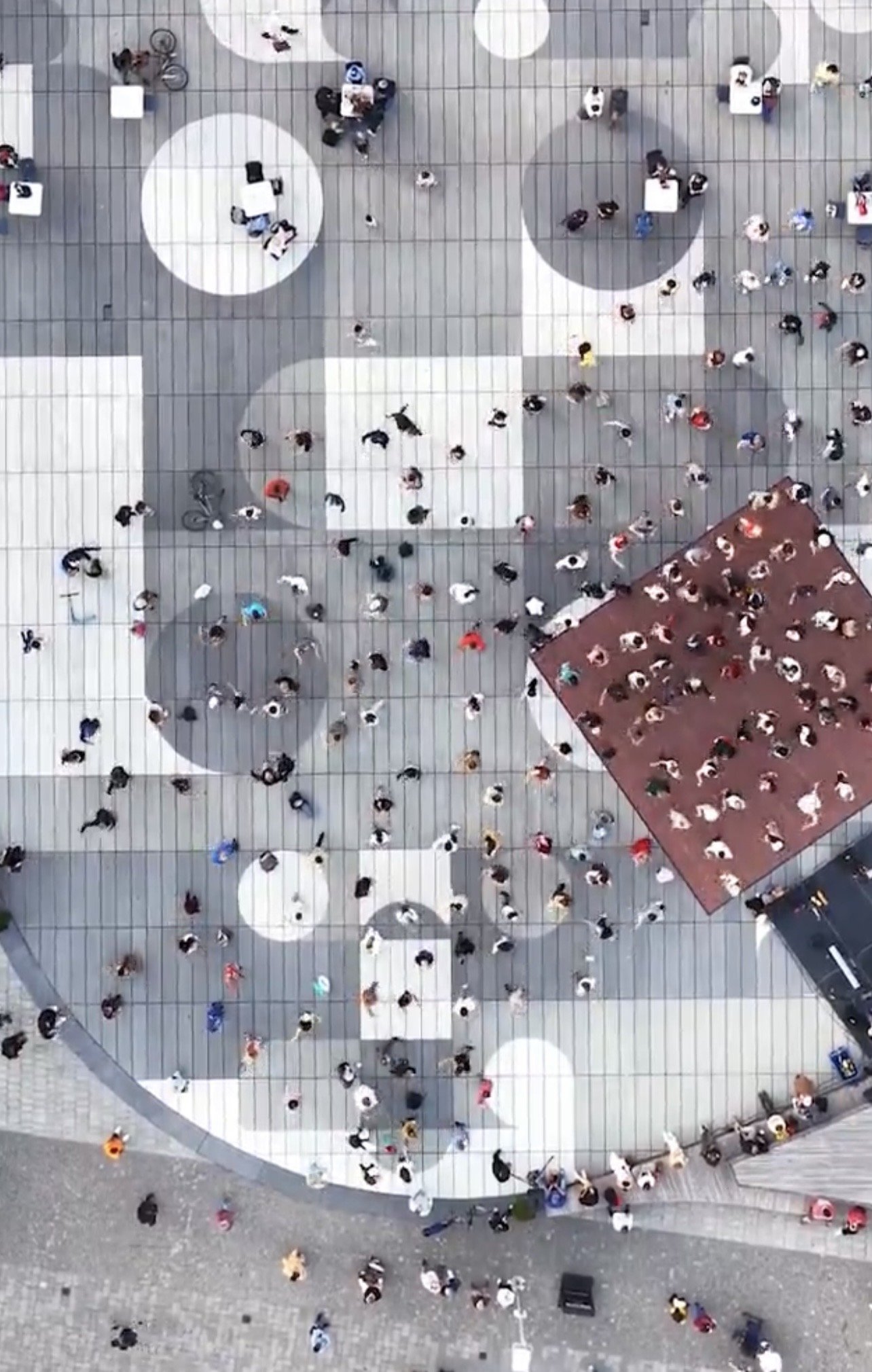 Harbourfront Centre Community Square – Drone view straight down onto the two-tone paving pattern with crowds and a dance floor