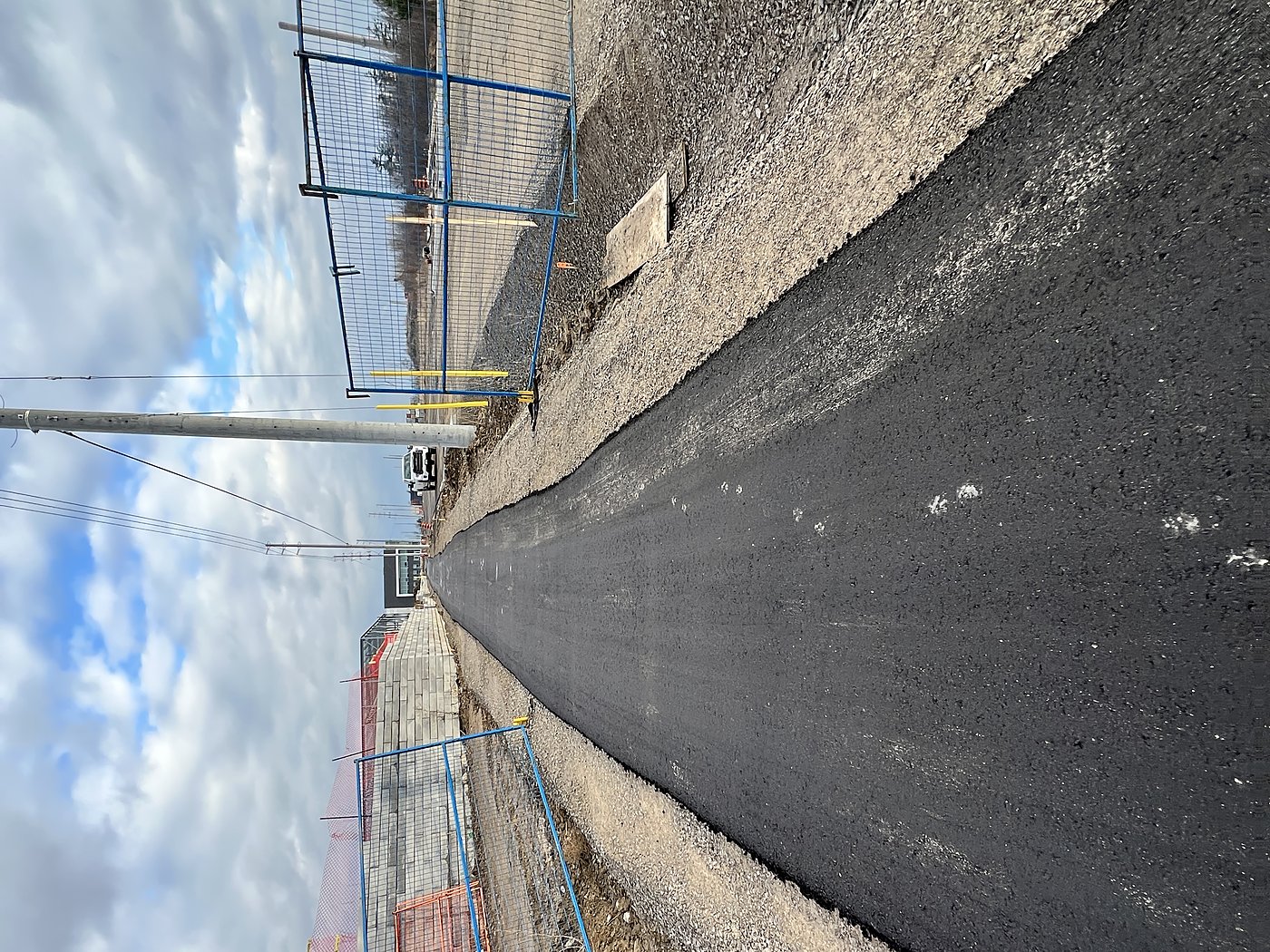 Fresh asphalt road section at Hazelhurst Road Extension
