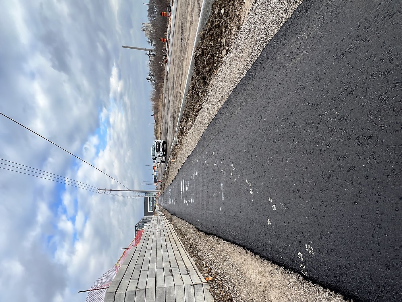Asphalt road with concrete retaining wall at Hazelhurst