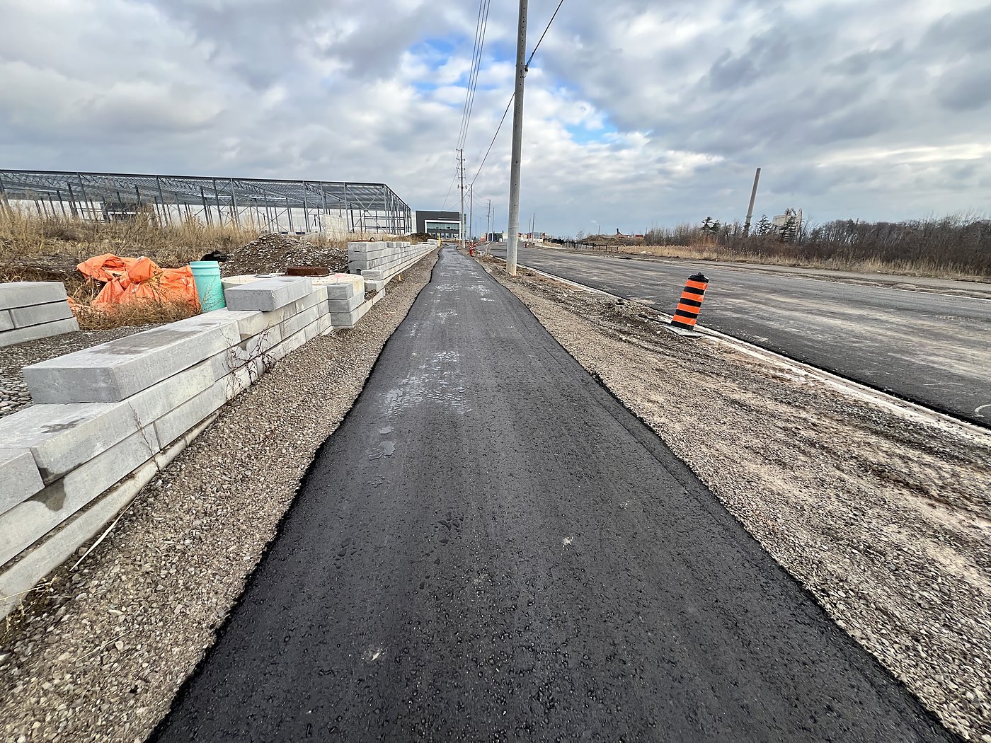 Temporary road connection with construction delineators