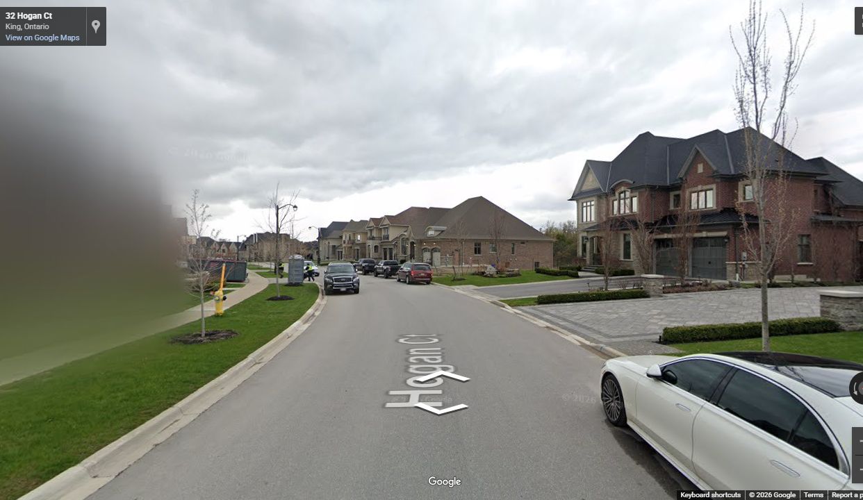 Completed King Station Phase 3 street with curbs, sidewalks, landscaping, and finished homes